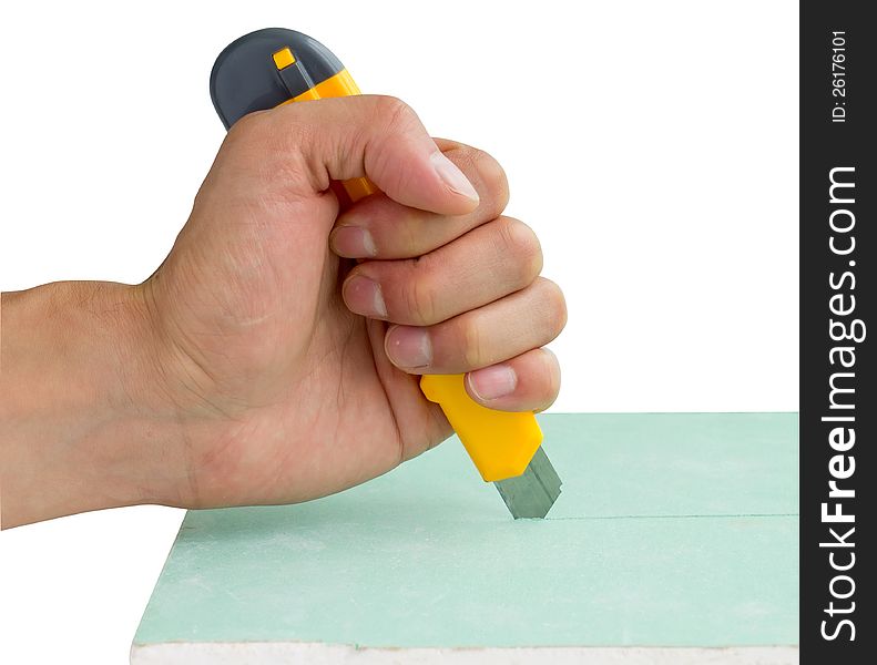 Builder's hand with knife isolated on white background. Include clipping path. Builder's hand with knife isolated on white background. Include clipping path