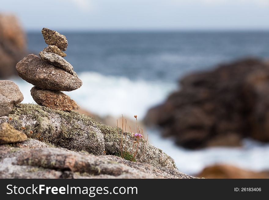 Stone pile at the rocky coast of Brittany