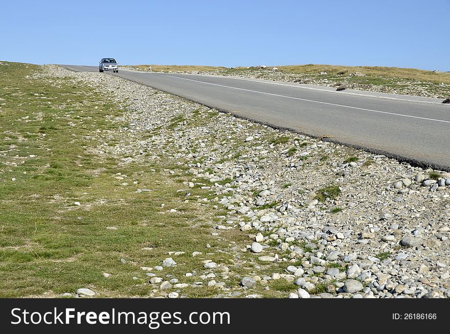 Curved road recently constructed to Padina, Bolboci, Pestera chalets in Bucegi mountains near Bucharest, Sinaia, Ploiesti and Brasov city in Romania. Curved road recently constructed to Padina, Bolboci, Pestera chalets in Bucegi mountains near Bucharest, Sinaia, Ploiesti and Brasov city in Romania