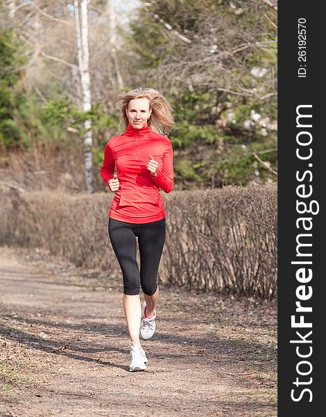 Girl Running In The Park