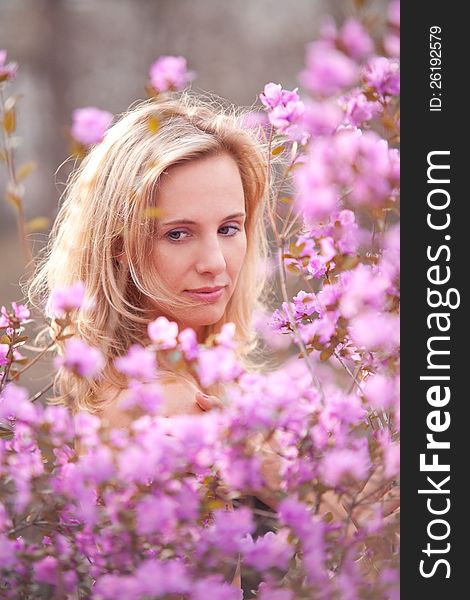 The portrait of a girl with flowers