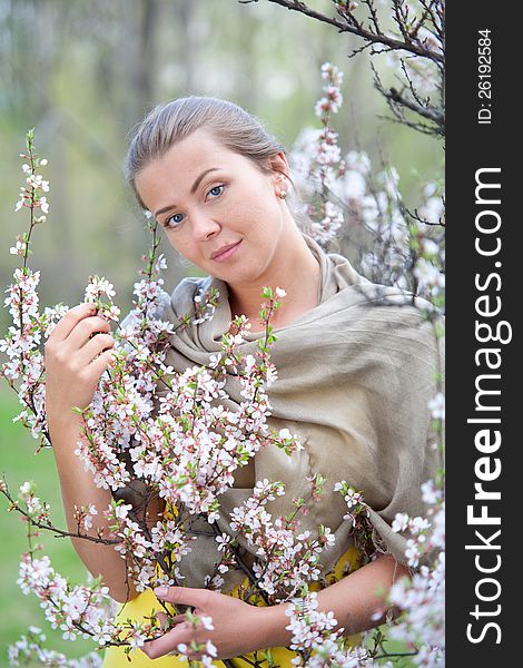 The portrait of a girl with flowers