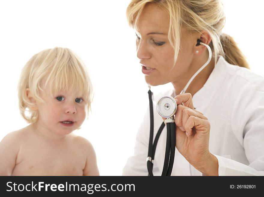 Young female doctor examines a child. Young female doctor examines a child