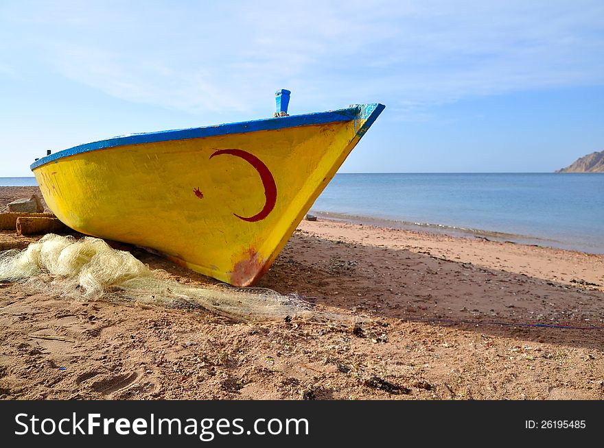 Old fisherman boat at the beach. Panorama. Old fisherman boat at the beach. Panorama