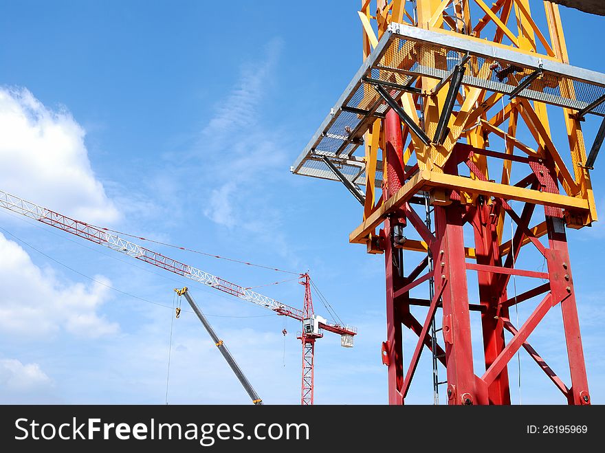 Construction crane isolated on clear blue sky