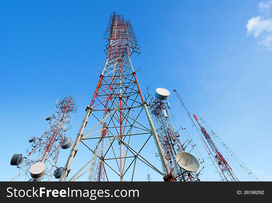 Telecommunication tower with a sunlight. Used to transmit television signals.