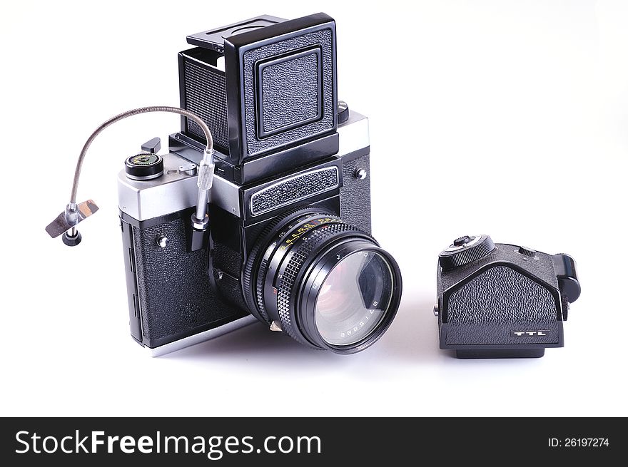 Large format camera with additional TTL prism against a white background. Large format camera with additional TTL prism against a white background