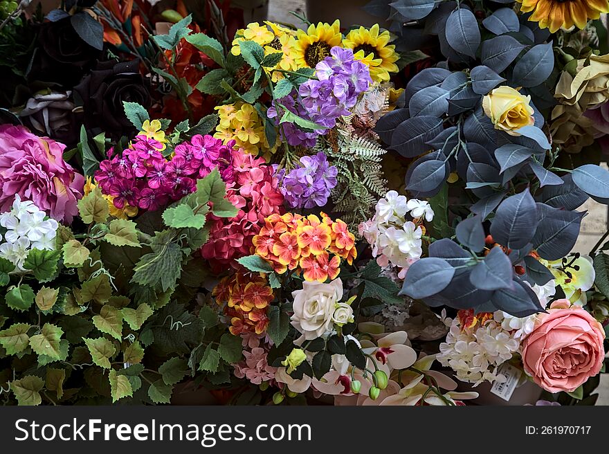 Fake Flowers On A Stall Seen Up Close