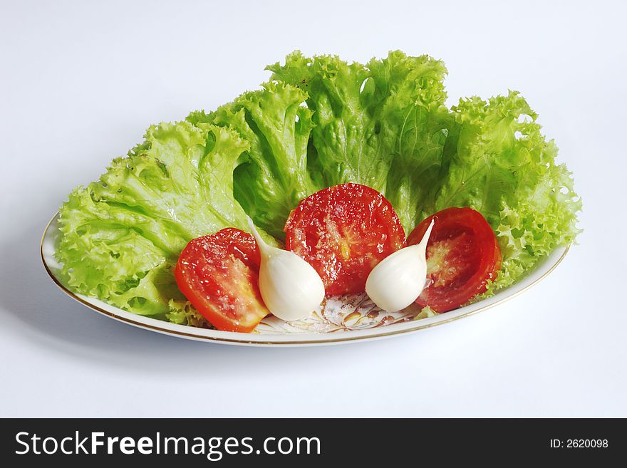 Little snack: cheese, crisp lettuce, garlic, tomato