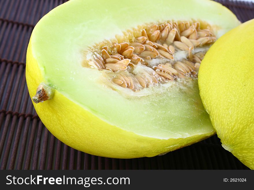 Canary melon isolated on white -yellow melon