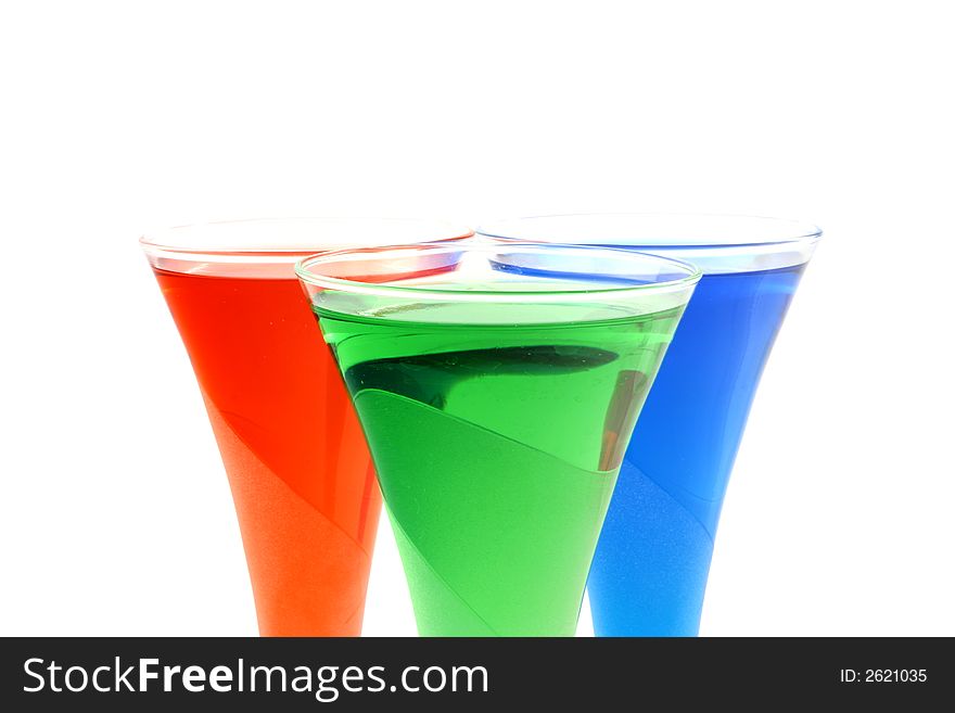View at red green and blue liquid in a glass. View at red green and blue liquid in a glass