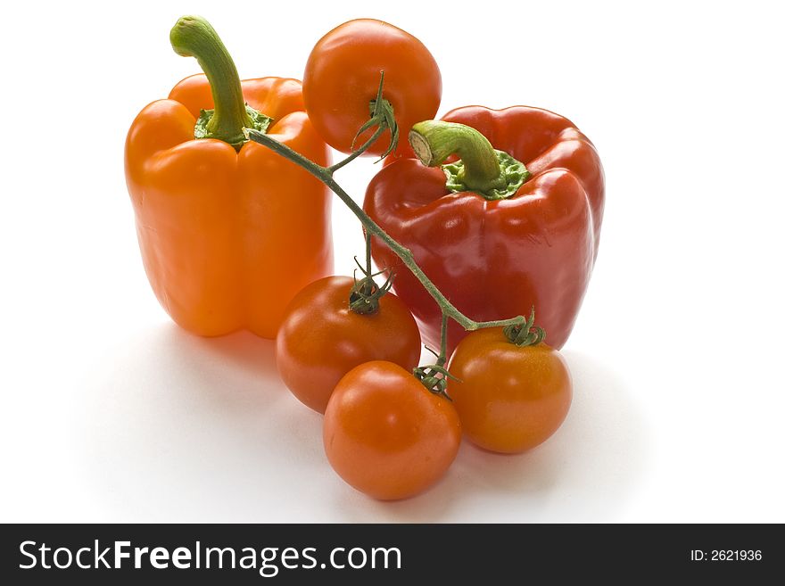 Red and orange peppers with tomatoes. Red and orange peppers with tomatoes