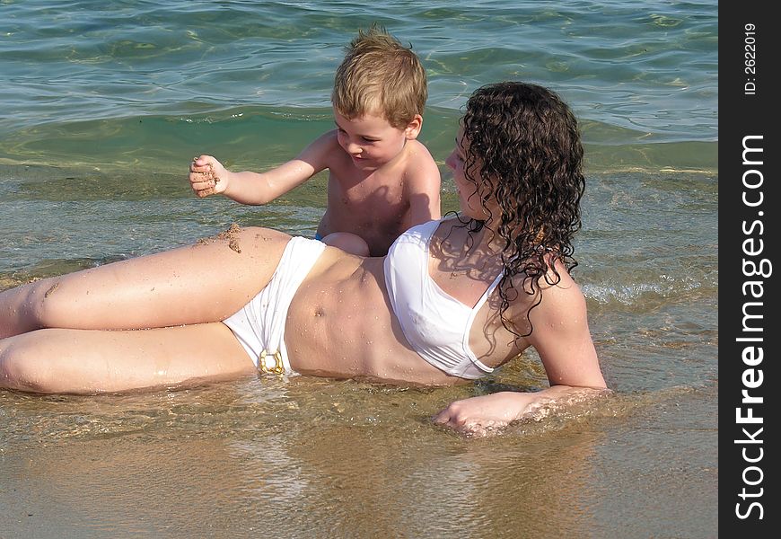Mother and son on a beach
