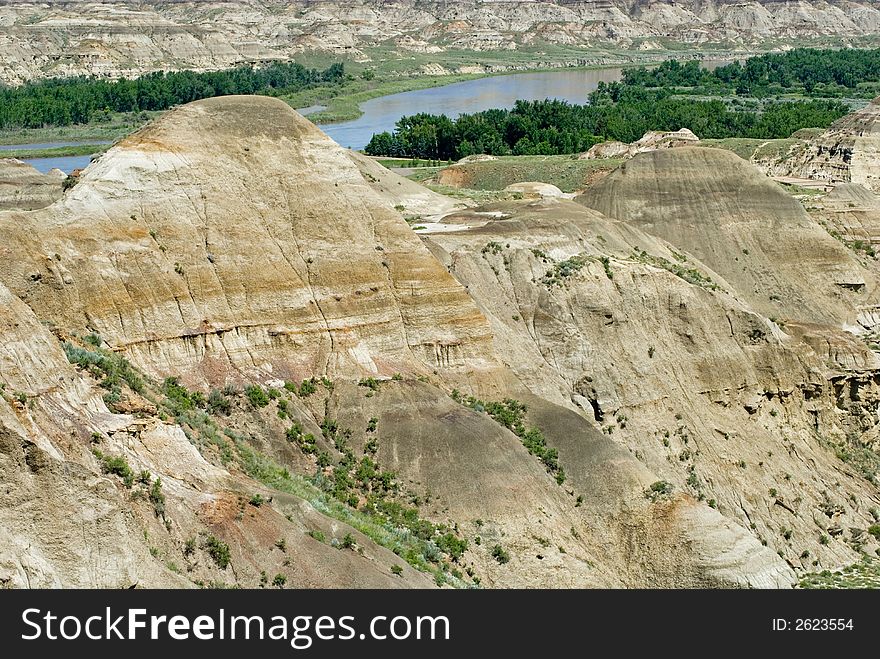 The Red Deer River flowing through the badlands of Dinosaur Provincial Park, Alberta - a UNESCO World Heritage Site.