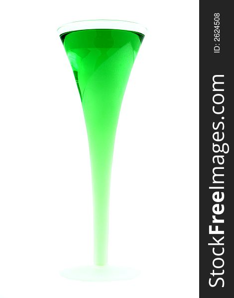 Green drink in a stylish glass on a white background
