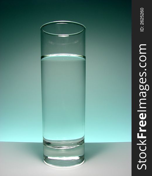 Glass with cold water ,glas background.