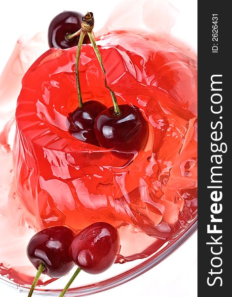 Jelly from a sweet cherry background-cooled entertainment in hot day. Jelly from a sweet cherry background-cooled entertainment in hot day