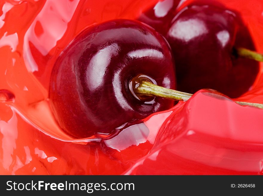 Jelly from a sweet cherry background-cooled entertainment in hot day. Jelly from a sweet cherry background-cooled entertainment in hot day