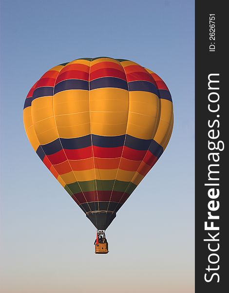 Hot air balloon with multiple colors in flight