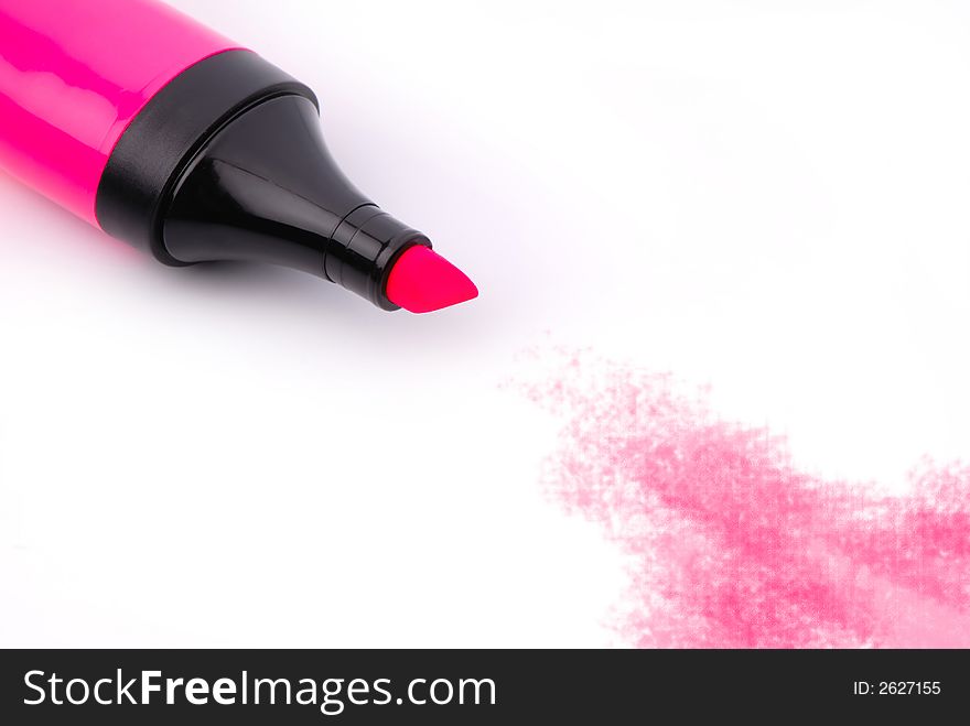 Pink color marker on white background, close-up