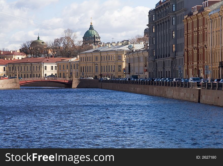 View of Moyka river with St.Isaak cathedral in St.Petersburg, Russia