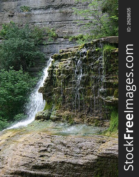 New York Waterfall near Ithica, beautiful landscape. Lush greenery adds viberant color.