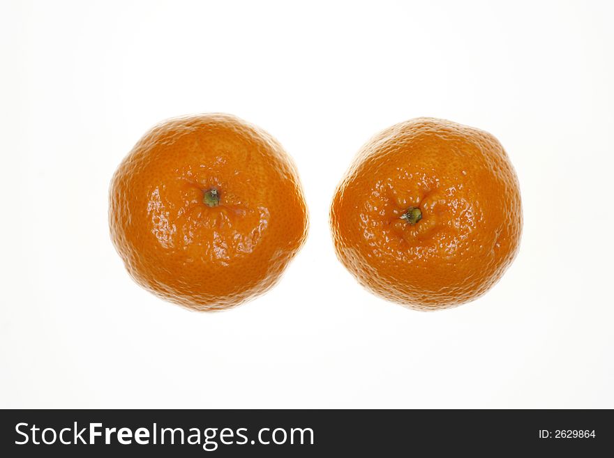 Two Mandarins against a white background