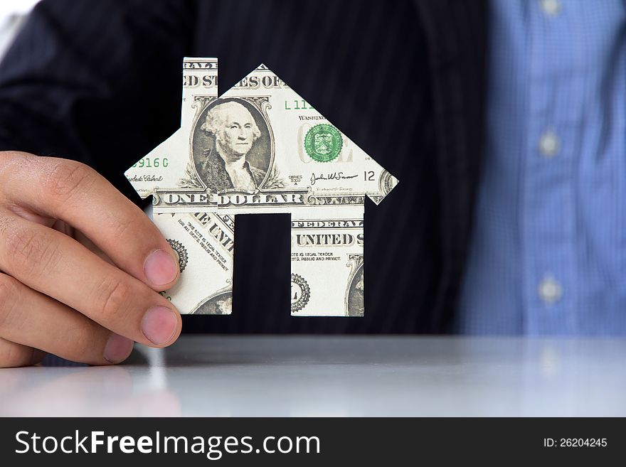 Business man business man holding banknote house icon. Business man business man holding banknote house icon