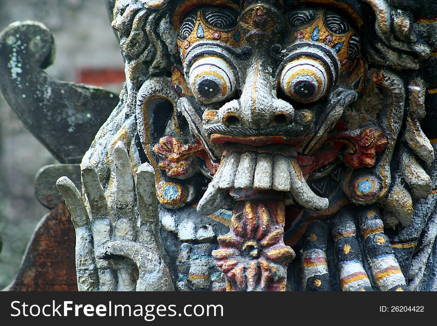 Scary sculpture in one of the temples in northern park of Bali, Indonesia. Scary sculpture in one of the temples in northern park of Bali, Indonesia