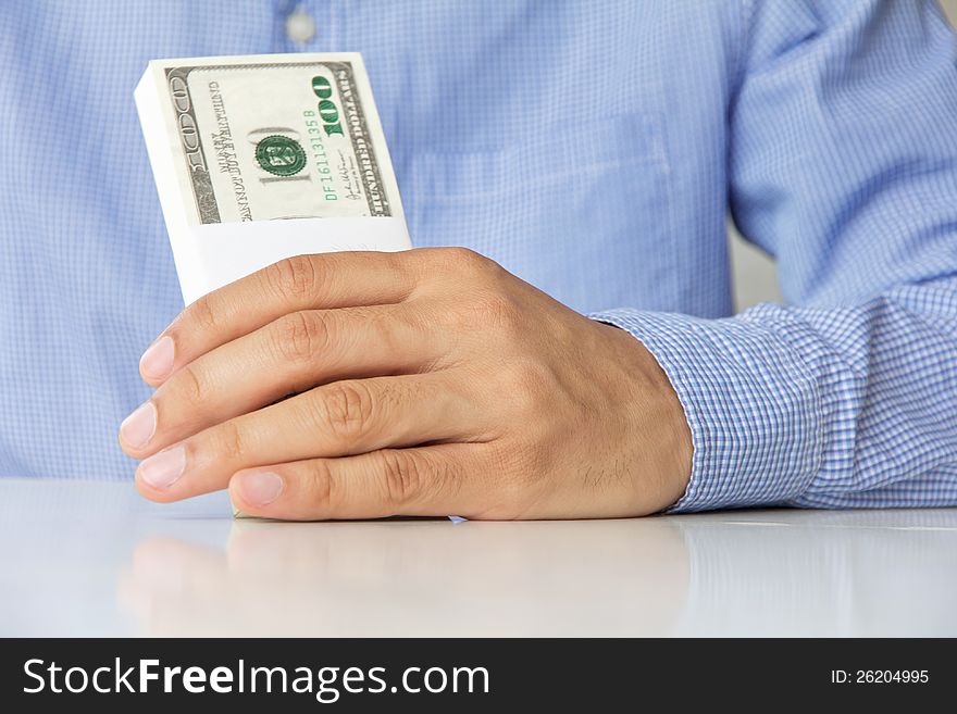 Image of hand hold money