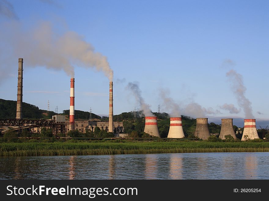 Smoky pipes of electric thermal station. Smoky pipes of electric thermal station