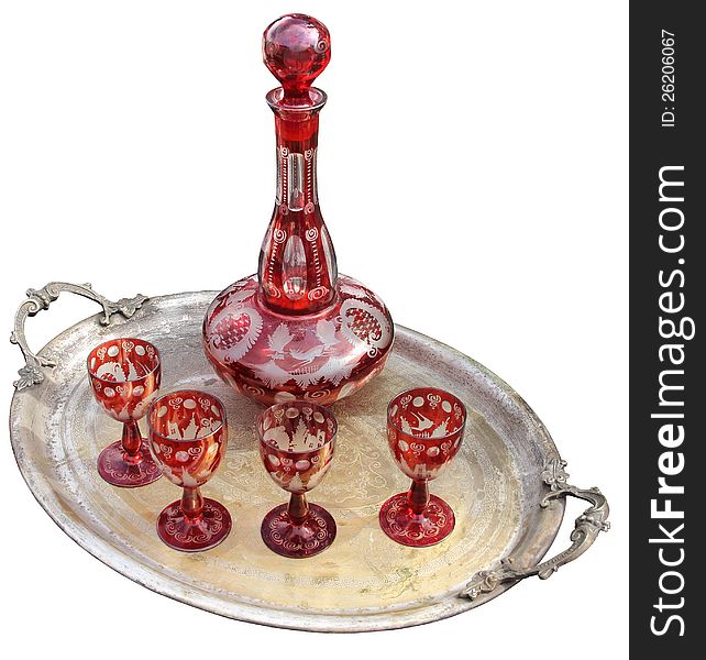 Set of red glasses with bottle on  the silver tray. Set of red glasses with bottle on  the silver tray