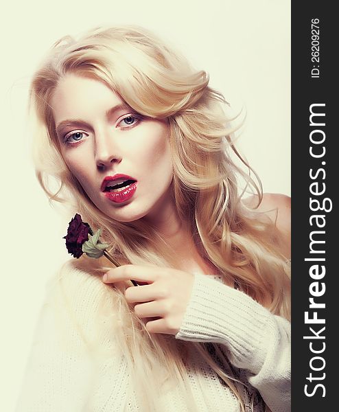 Pretty Female Face. Blond Long Hair. Red Flower