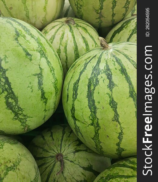 pile of green skin watermelons