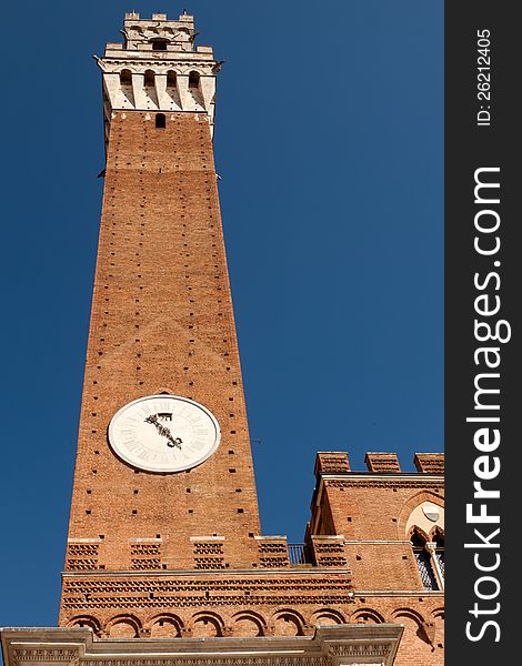 The medieval tower of Torre del Mangia in Siena, Italy