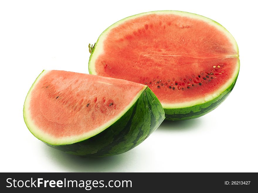 Half and slice of watermelon on white background