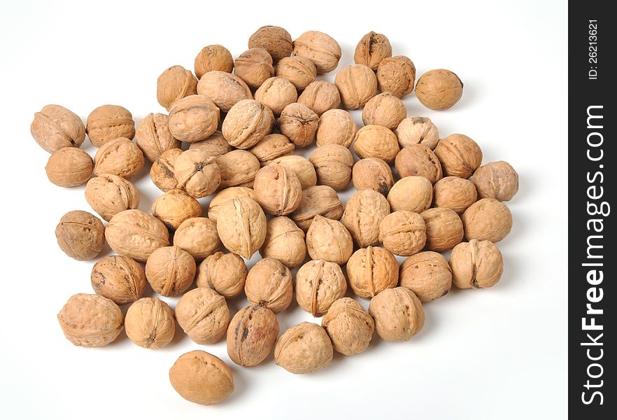 Brown walnuts  on white background