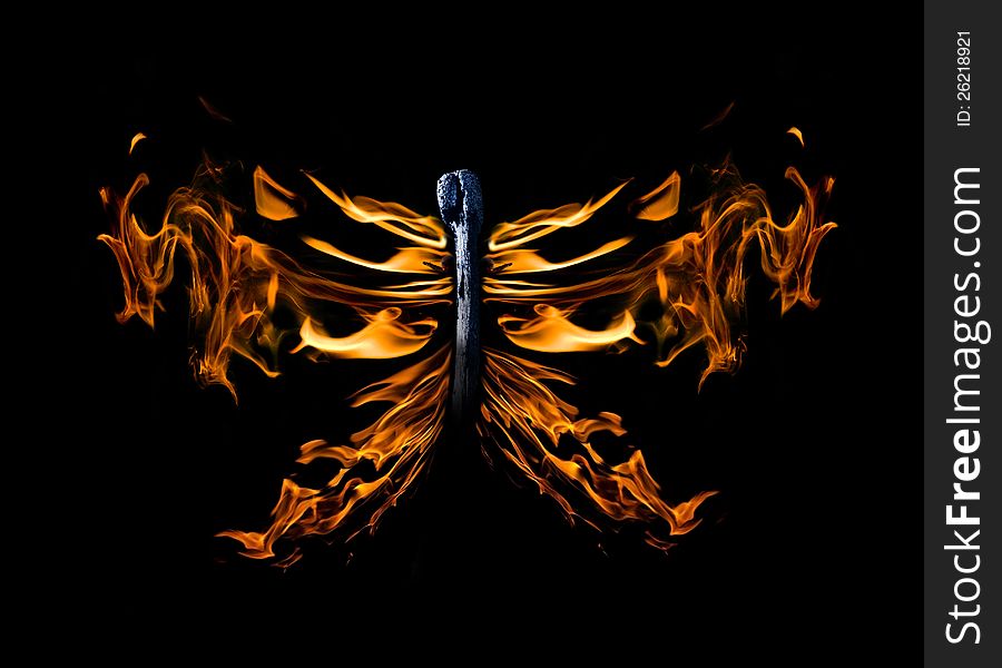 Butterfly shape flame on match isolated on black background