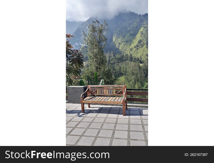 chair with mountain view in the background