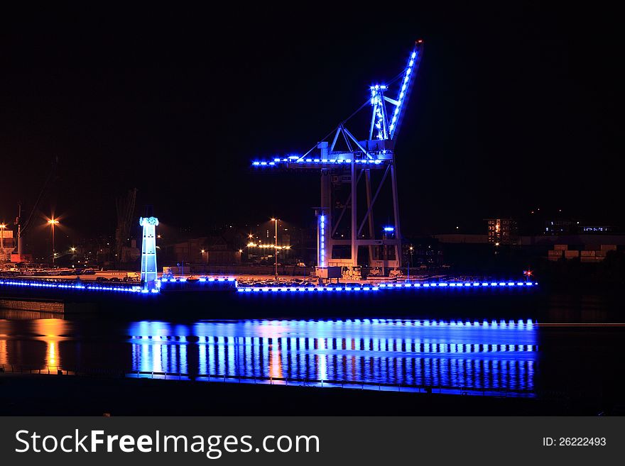 Blue industrial plant at night in port of Hamburg. Blue industrial plant at night in port of Hamburg.