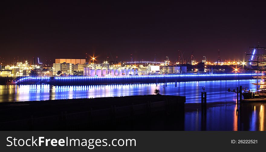 Blue industrial plant at night in port of Hamburg. Blue industrial plant at night in port of Hamburg.