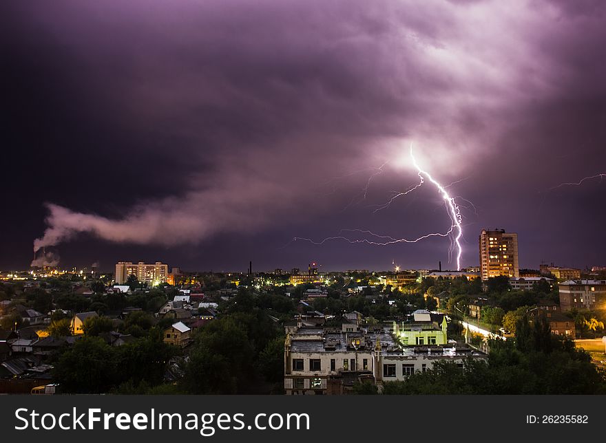 Lightning during a thunderstorm in the night city. Lightning during a thunderstorm in the night city