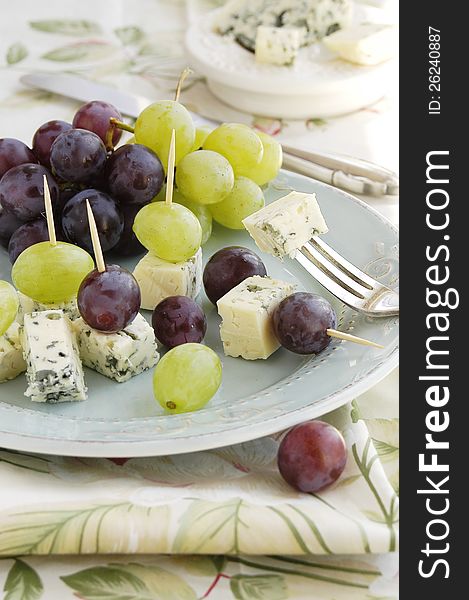 Plate of blue cheese and grapes for a small snack