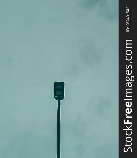 street lamp with a calm blue sky. street lamp with a calm blue sky