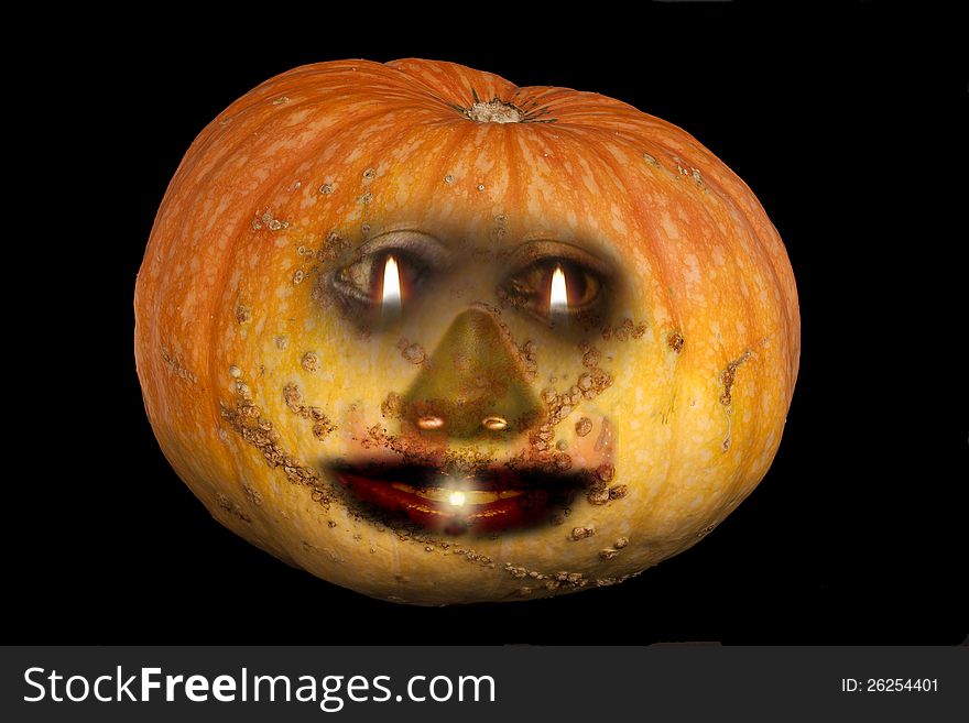 Natural, home-grown pumpkin isolated on black background. Face drawn on pumpkin as it is cut out on halloween. Natural, home-grown pumpkin isolated on black background. Face drawn on pumpkin as it is cut out on halloween.