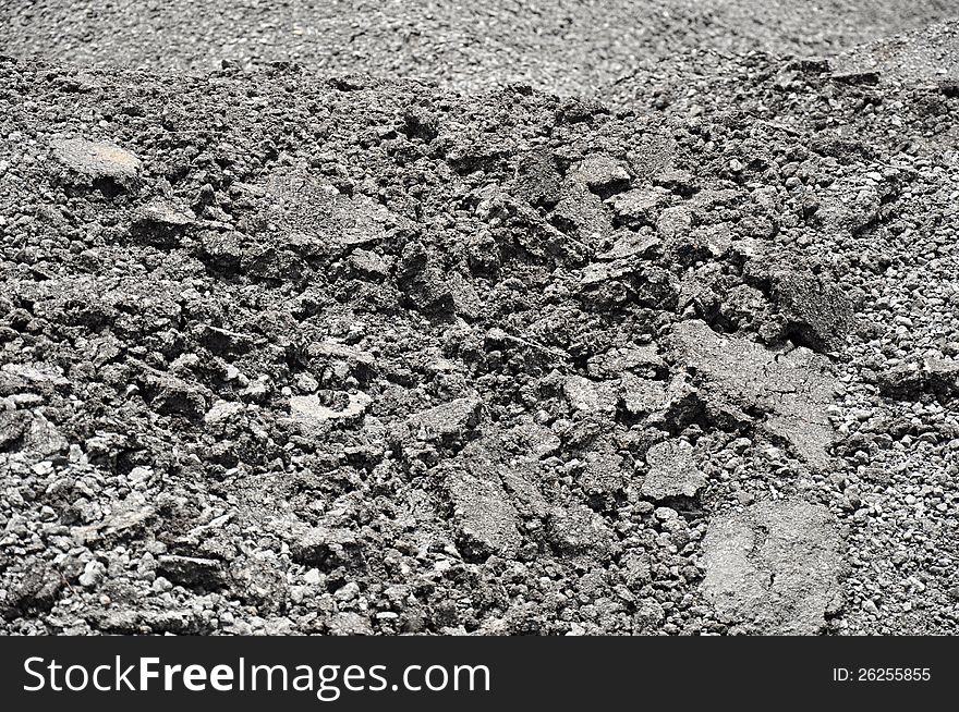 Mixed small gravels and asphalt background