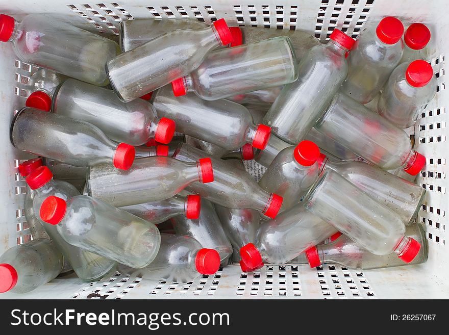 Old bottles in the basket for recycle