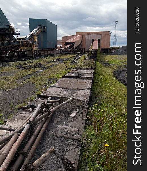 Old industrial conveyor belts and buildings. Old industrial conveyor belts and buildings