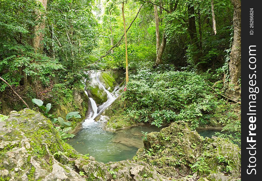 Natural Waterfall In Forest