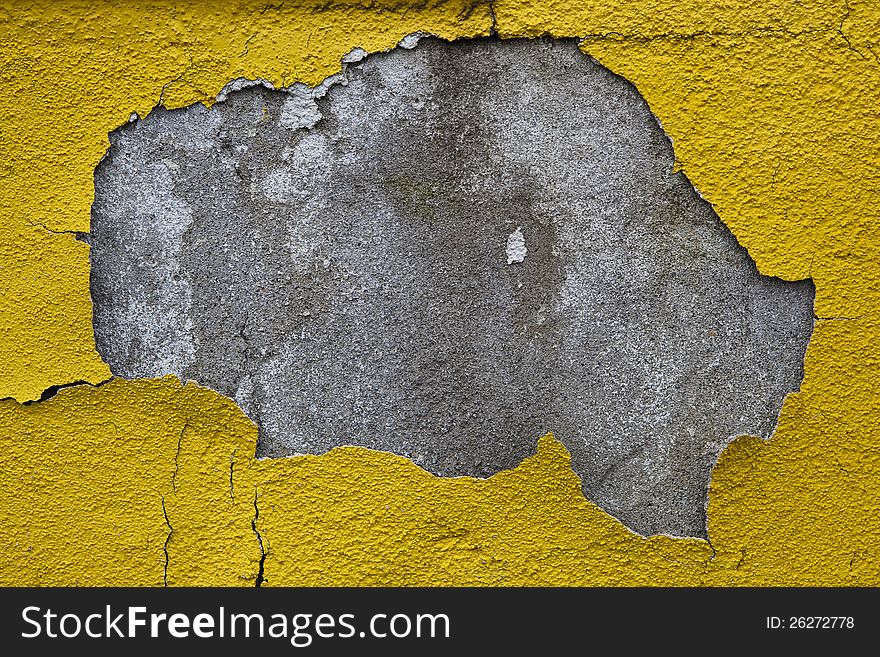 Old wall with dirty broken weathered yellow paint. Old wall with dirty broken weathered yellow paint